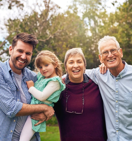 Multi generational family posing for a photo